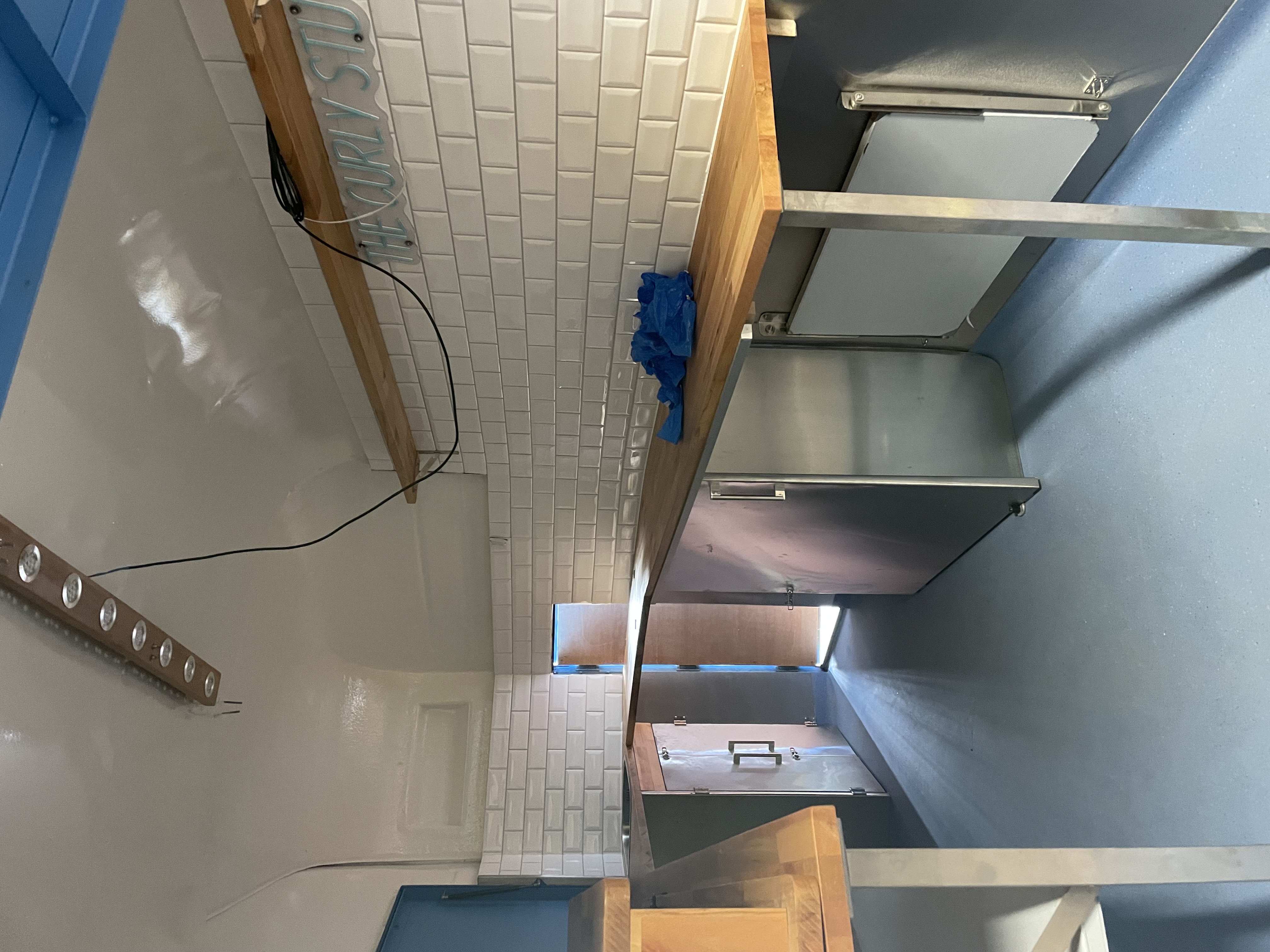 Every millimetre matters — Oak worktops · stainless equipment · certified electrics